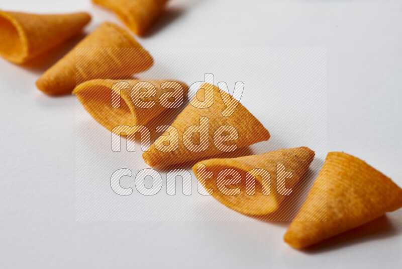 Assorted snacks on white background