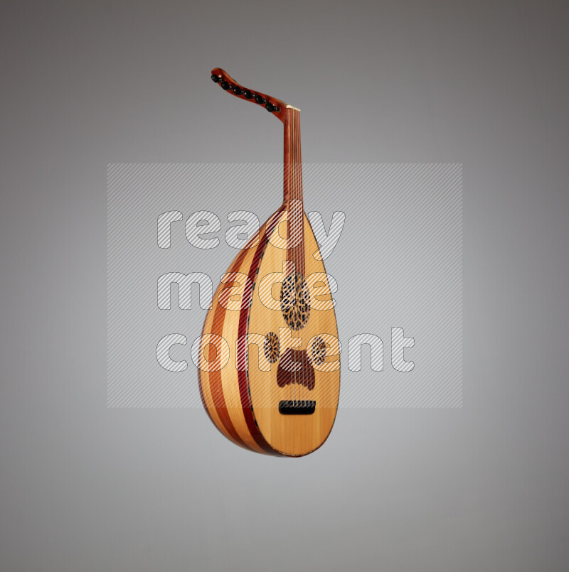 a wooden brown Oud on a gray background