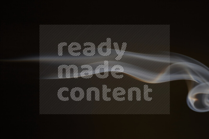 Motion of wavy smoke isolated on dark background