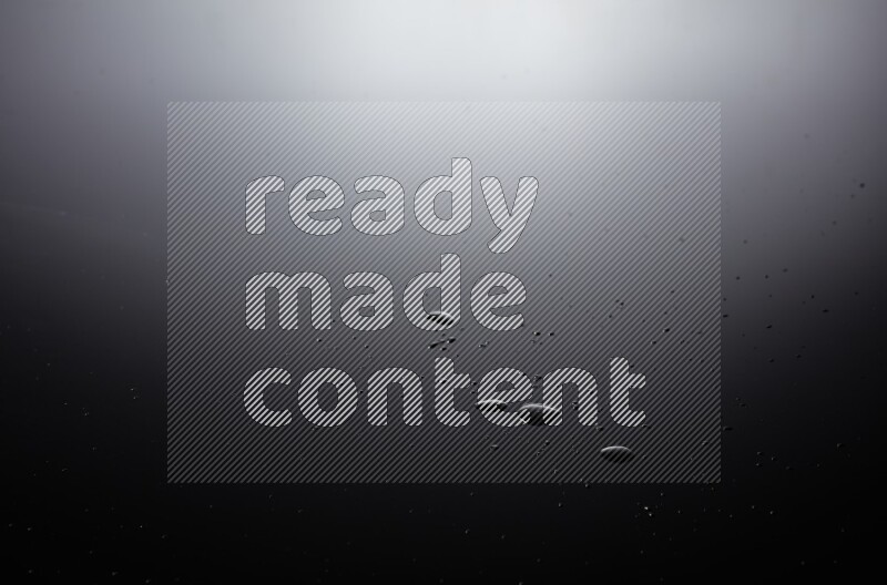 water drops, and droplets on black background