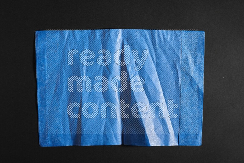 Colored plastic textures on black background