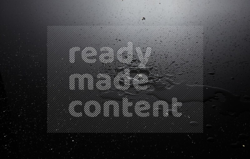 water drops, and droplets on black background