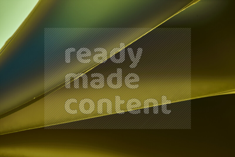 فن تجريدي يعرض منحنيات مع تدرجات الألوان الباردة مكونه بضوء ملون