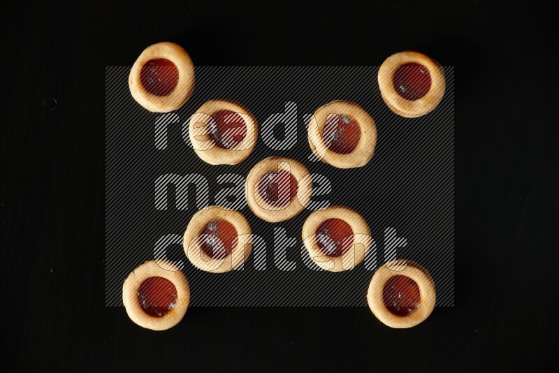 Jam cookies on a black background