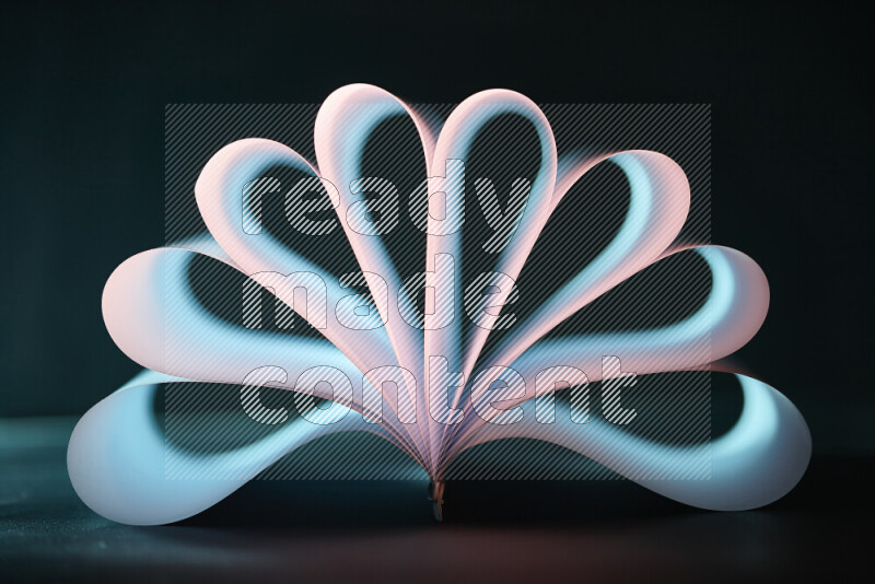 An abstract art piece displaying smooth curves in blue and white gradients created by colored light