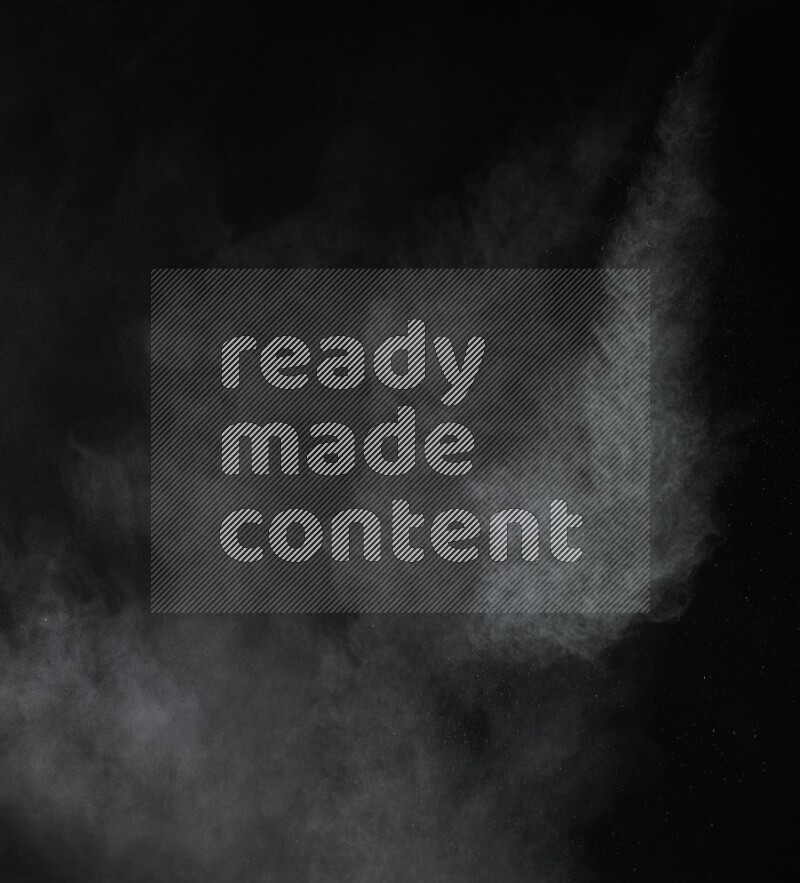 A side view of green powder explosion on black background