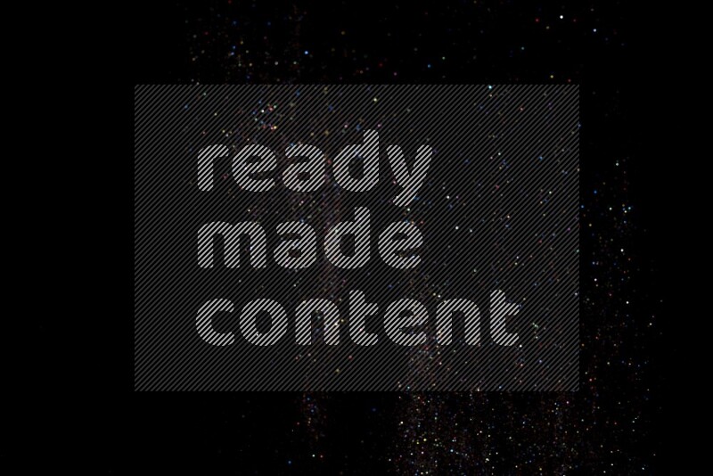 Multicolored glitter powder isolated on black background