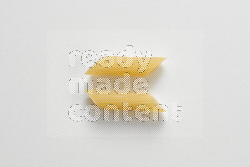 Penne pasta on white background