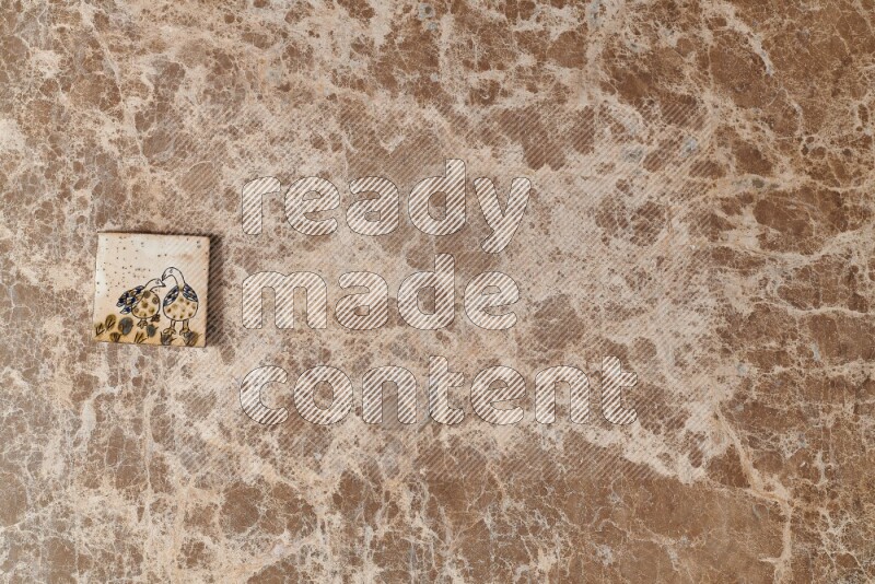 A decorative coaster on beige marble background