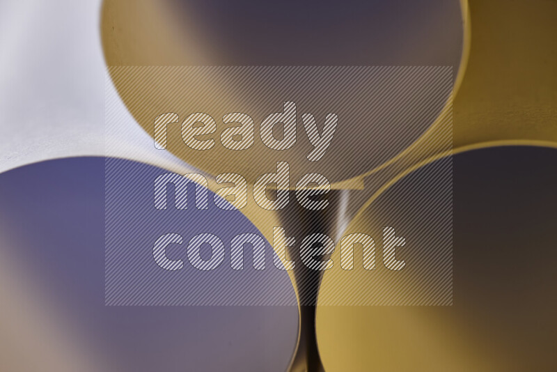 The image shows an abstract paper art with circular shapes in varying shades of grey and warm tones