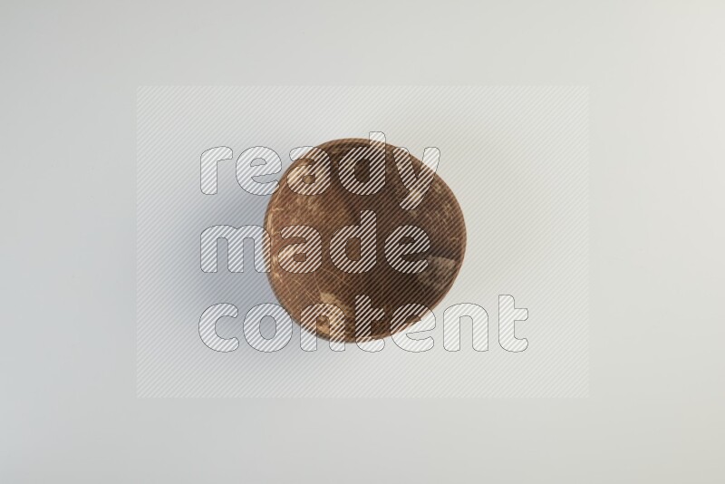 Wooden bowl and plate on white background