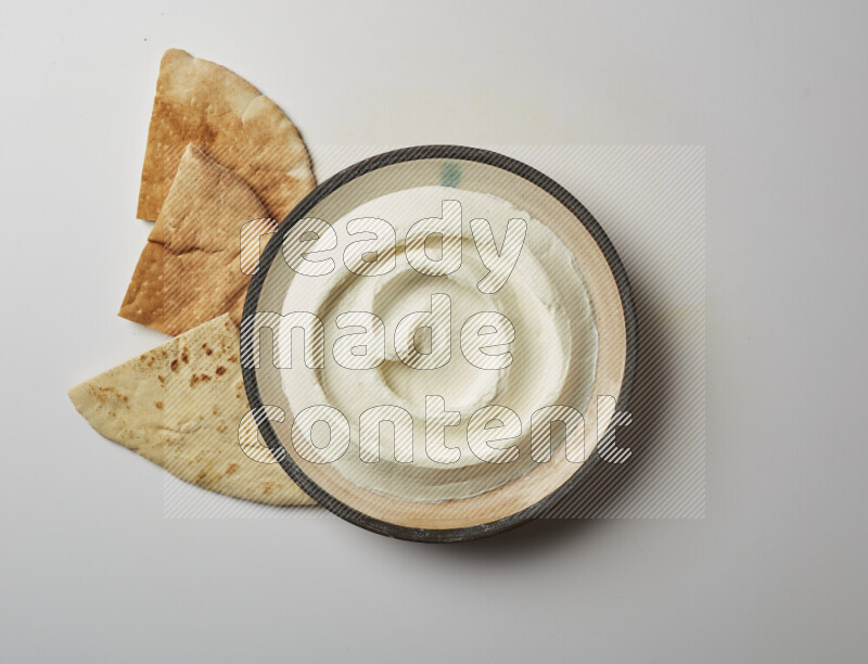 plain Lebnah in a pottery plate on a white background