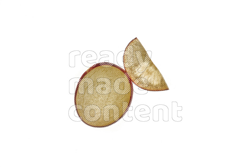 Plum slices on illuminated white background