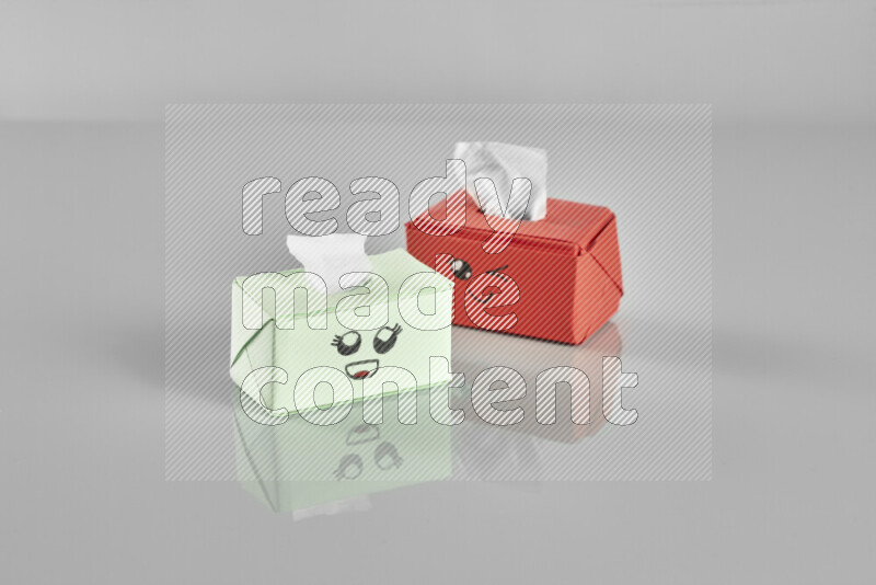 Origami tissue box on grey background