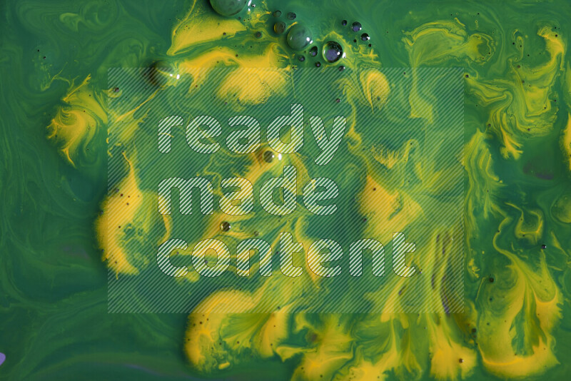 خلفية ملونة مع مزيج من ألوان الطلاء الأخضر والأصفر