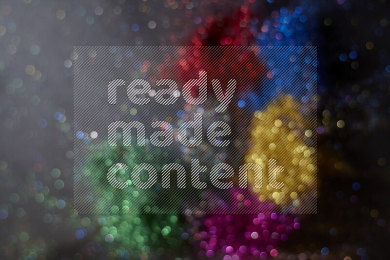 Multicolored glitter powder isolated on black background