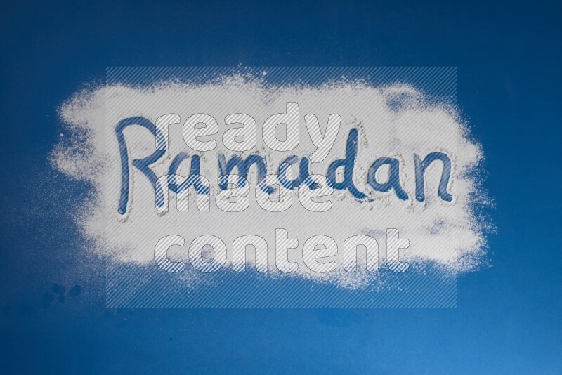 A word written with white powder on blue background