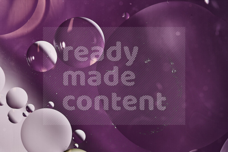 Close-ups of abstract oil bubbles on water surface in shades of white and purple