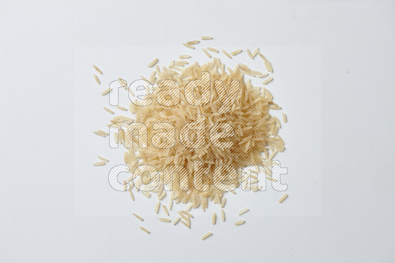 Basmati golden rice on white background