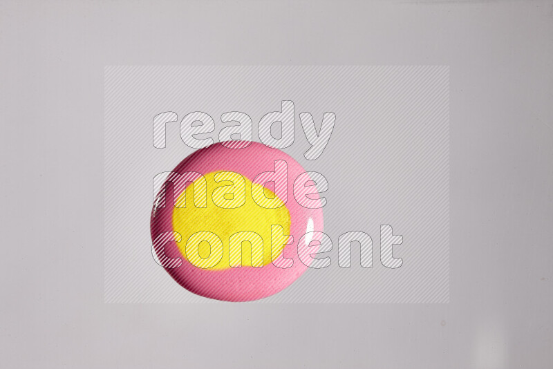 Close-ups of assorted colors blending on a grey background