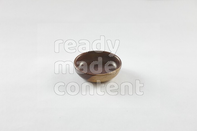 A wooden bowl on white background