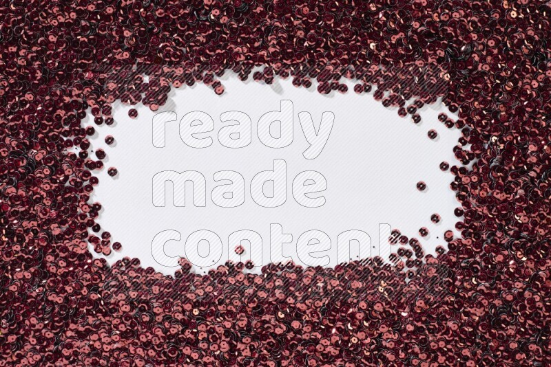 Multicolored flat sequins on grey background