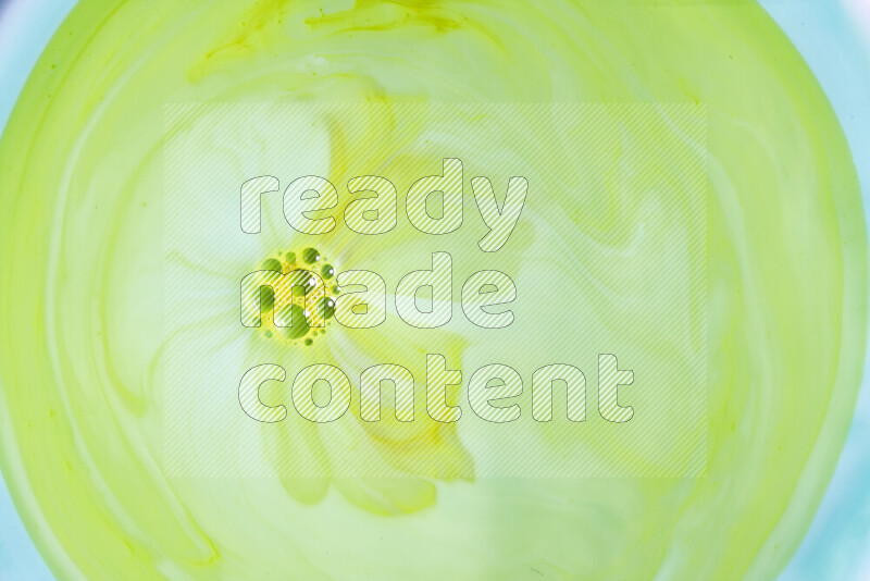 A close-up of abstract swirling patterns in green gradients