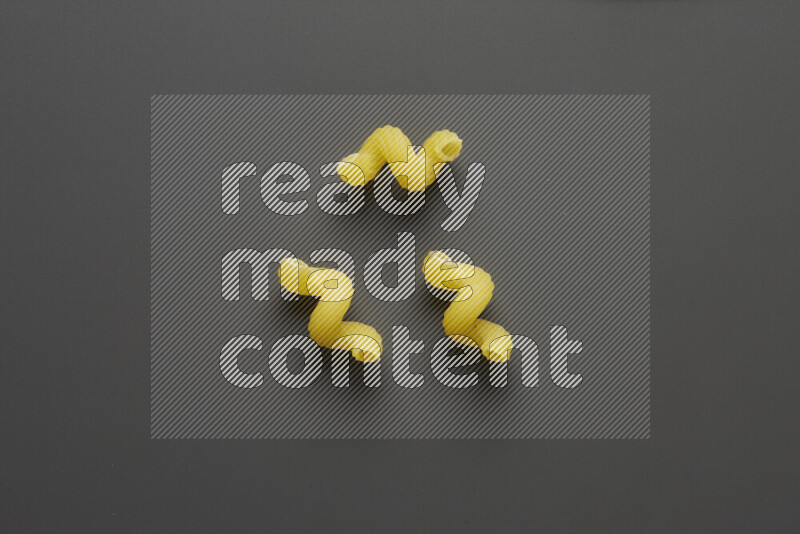 Twist pasta on grey background