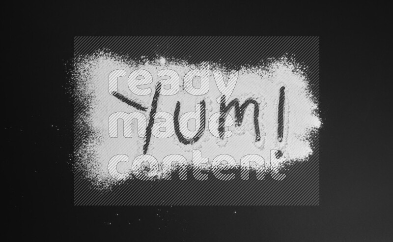 A word written with powder on black background