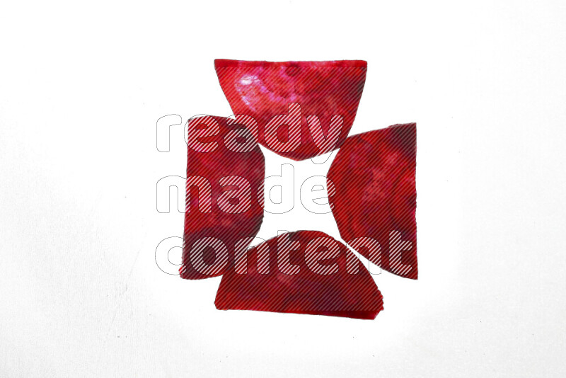 Beet slices on illuminated white background