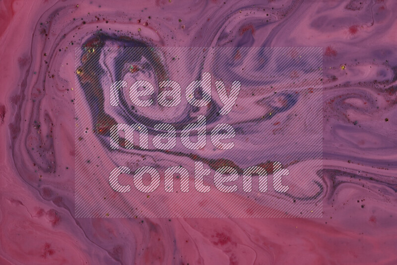 A close-up of abstract swirling patterns in red and blue with colored particles