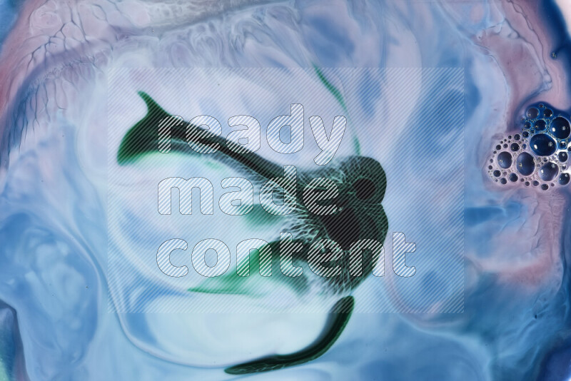 A close-up of abstract swirling patterns in blue, pink and green