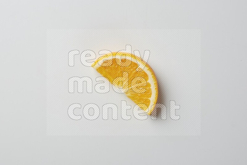 An orange half slice on white background