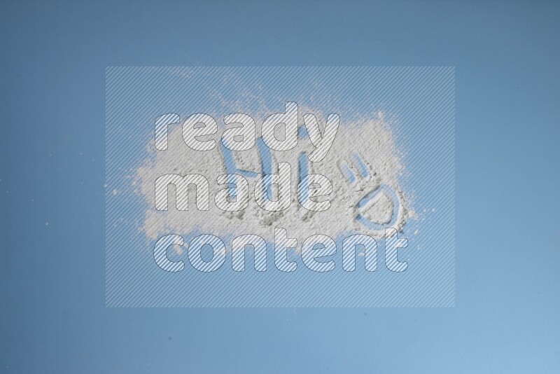 A word written with white powder on blue background