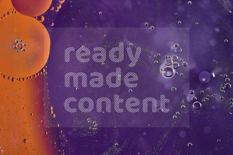 Close-ups of abstract oil bubbles on water surface in shades of orange and purple