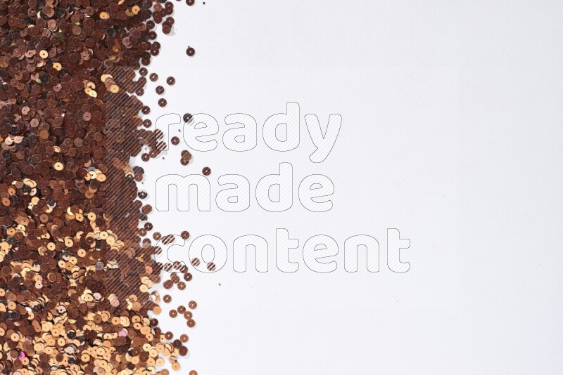 Multicolored flat sequins on grey background