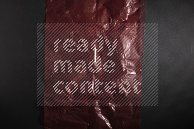 Colored plastic textures on black background