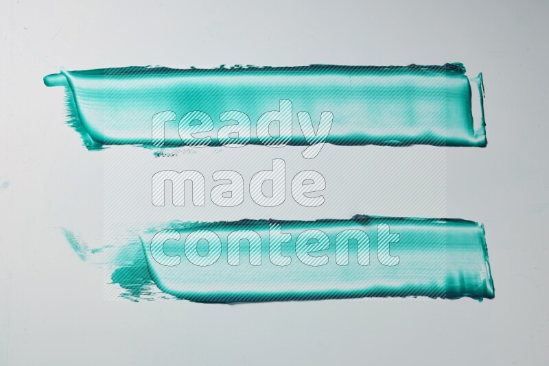 Turquoise painting knife strokes on white background