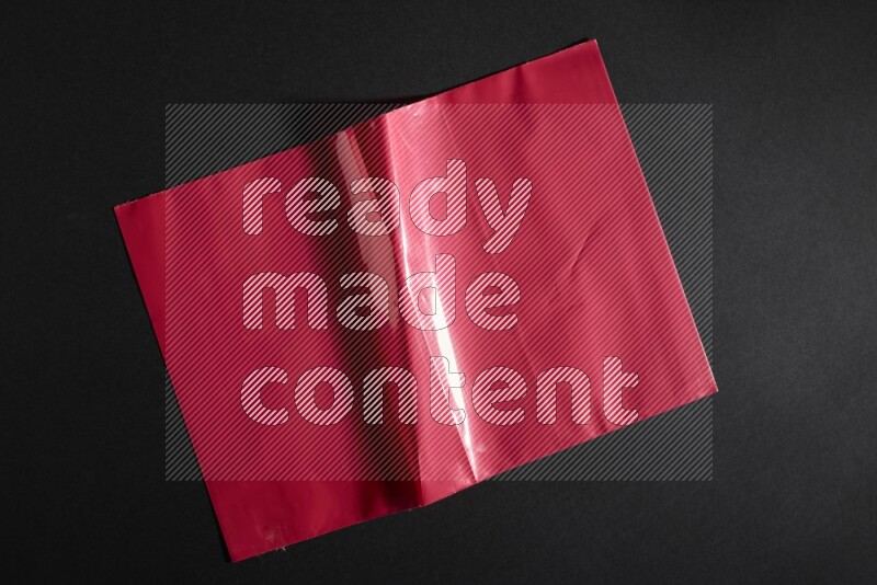 Colored plastic textures on black background