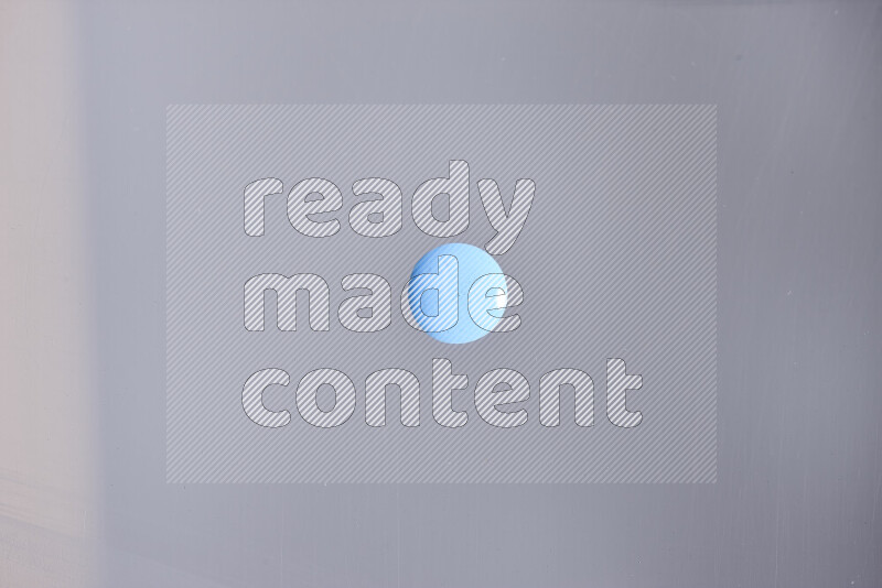 Close-ups of abstract blue paint droplets on the surface