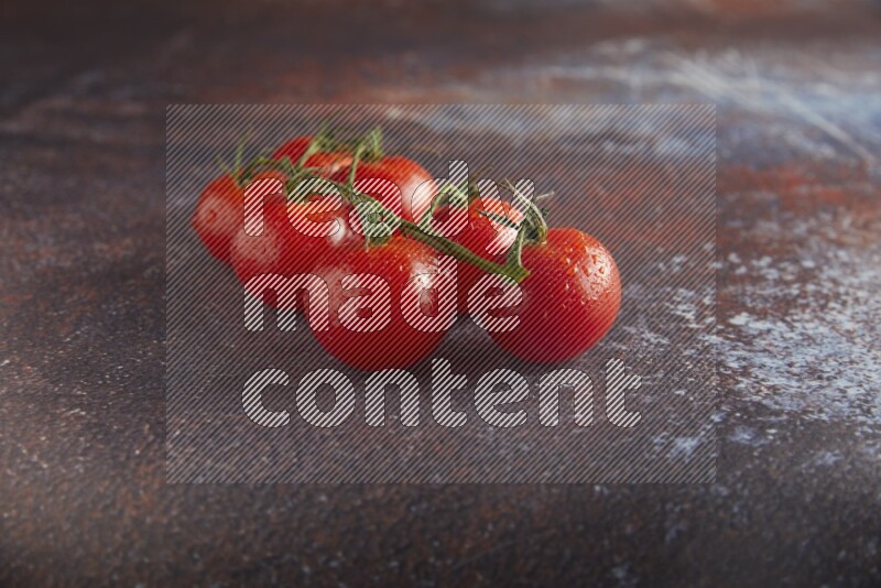 red cherry tomato vein on a reddish rustic metal background 45 degree