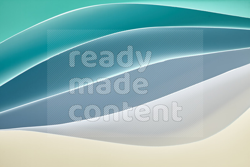 This image showcases an abstract paper art composition with paper curves in green and different warm gradients created by colored light