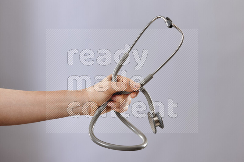 Female doctor wearing an abaya and medical attire in different positions