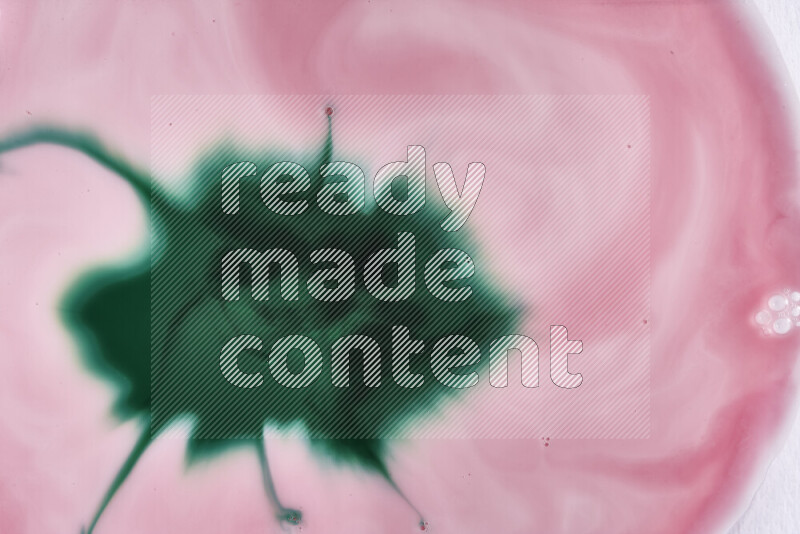 A close-up of abstract swirling patterns in red and green