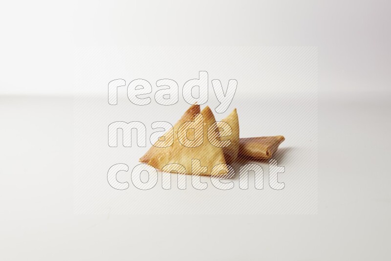 sambosas on a white background