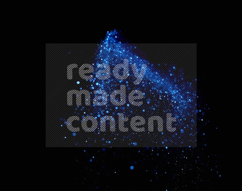 Blue glitter powder isolated on black background