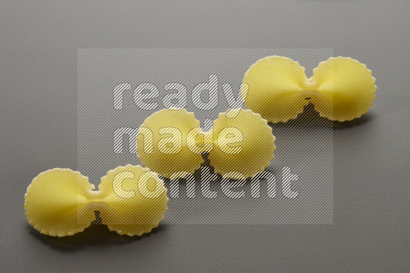 Fiocchi pasta on grey background