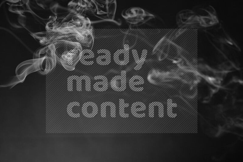 Motion of wavy smoke isolated on dark background