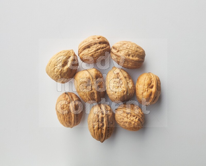 Top-view shot of walnut on white background