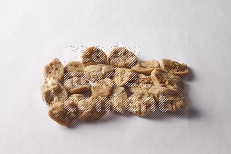 Dried figs on white background